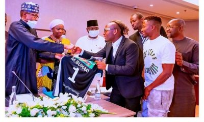Godwin presents his club's jersey to Buhari