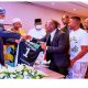 Godwin presents his club's jersey to Buhari