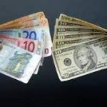 Euro continues to slide toward dollar parity