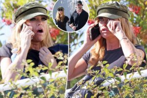 Denise Richards cries on phone after road-rage shooting